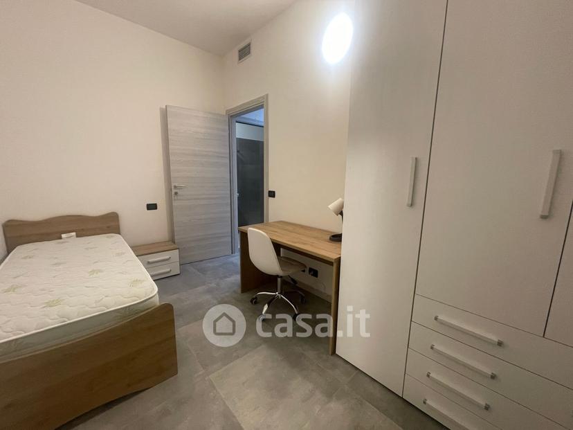 Stanza in Via Bartolomeo Spani 18 d — foto 8 di 35