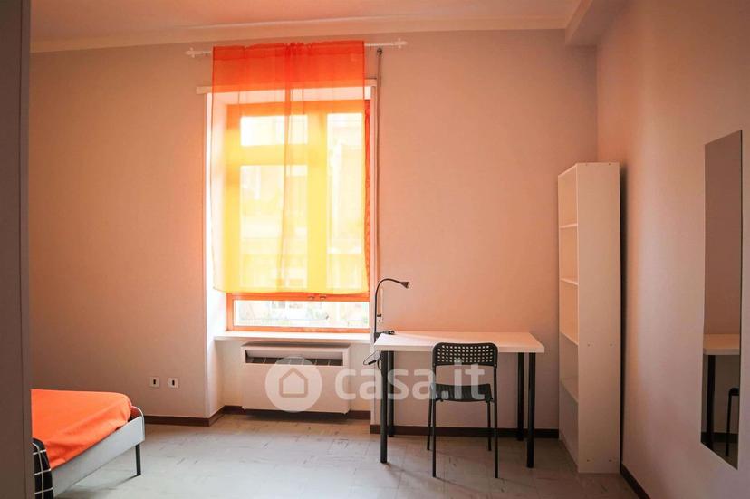 Stanza in Via Tigellio 24 — foto 14 di 22