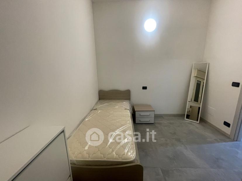 Stanza in Via Bartolomeo Spani 18 d — foto 9 di 35