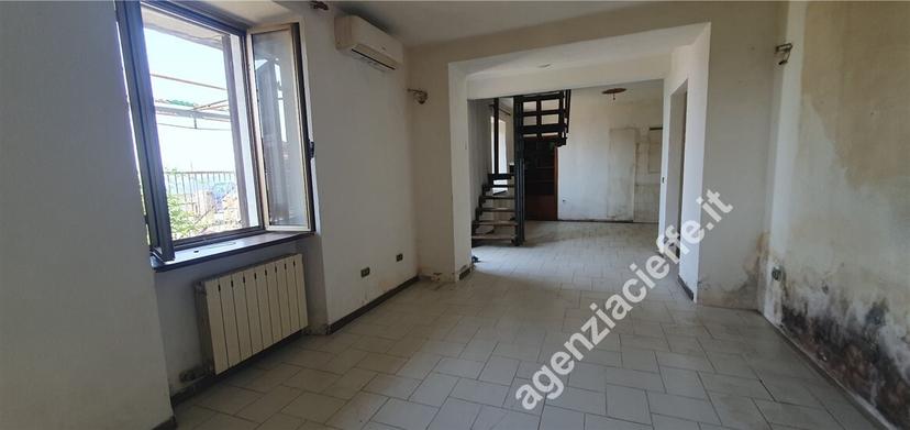 Villa a schiera, Massa