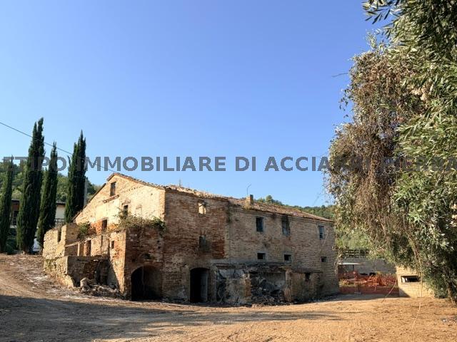 Villa a schiera, Massignano
