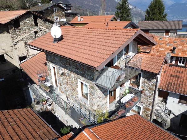 Sasso in Vicolo Mercanti in Veneto, Pianello del Lario