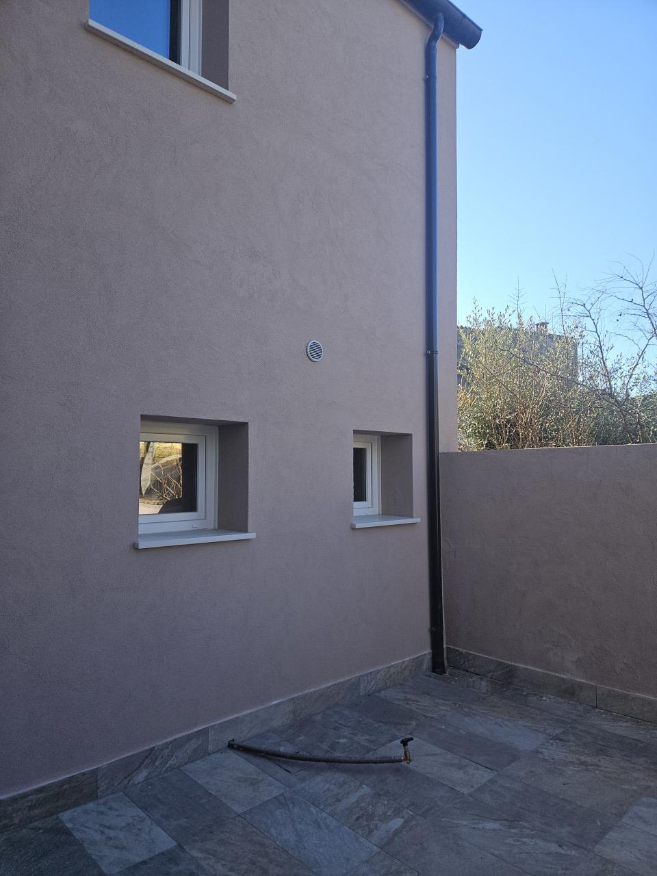 Villa a schiera, Este