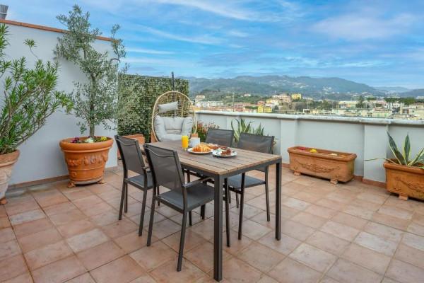 Attico, La Spezia