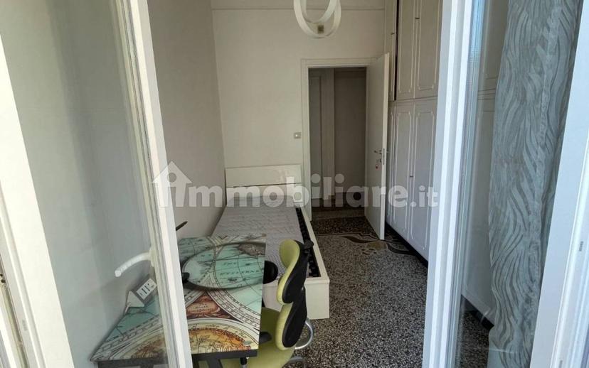 Stanza singola via Leon Battista Alberti 8, Genova — foto 10 di 10